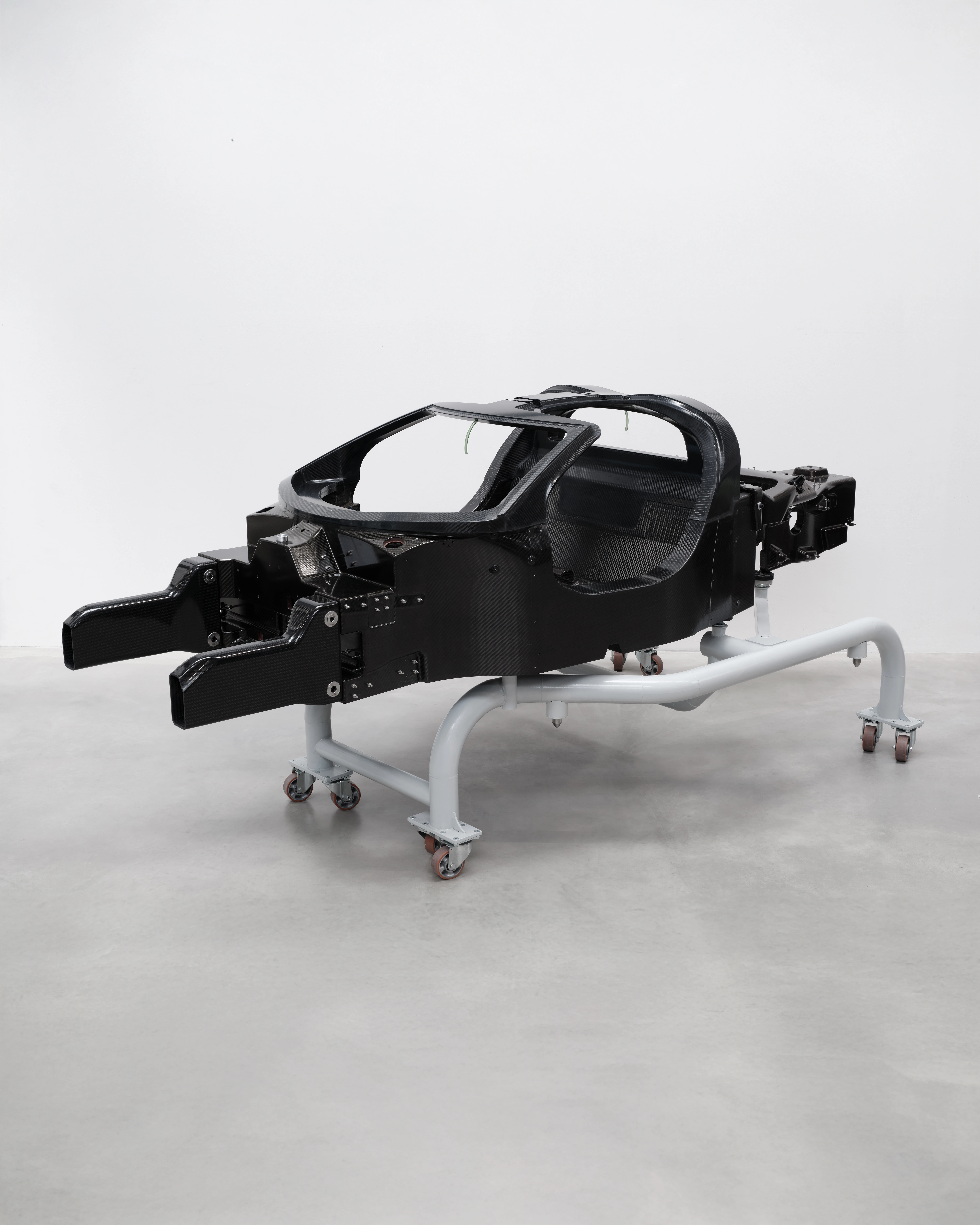 The bare Capricorn carbon-fibre monocoque, showing the safety cell and integrated structure