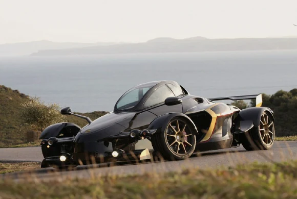 Tramontana sports car beside the Mediterranean