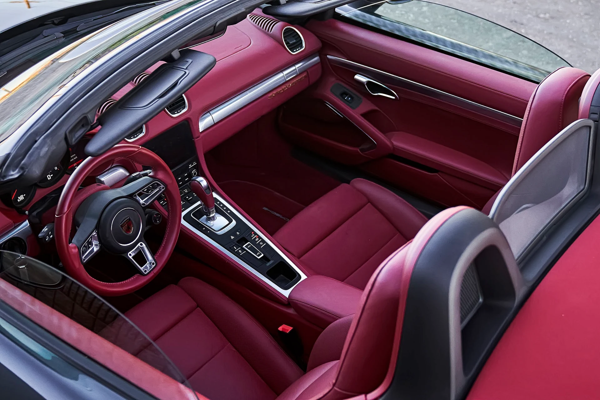 Red leather cabin of the graphite Speedster from above
