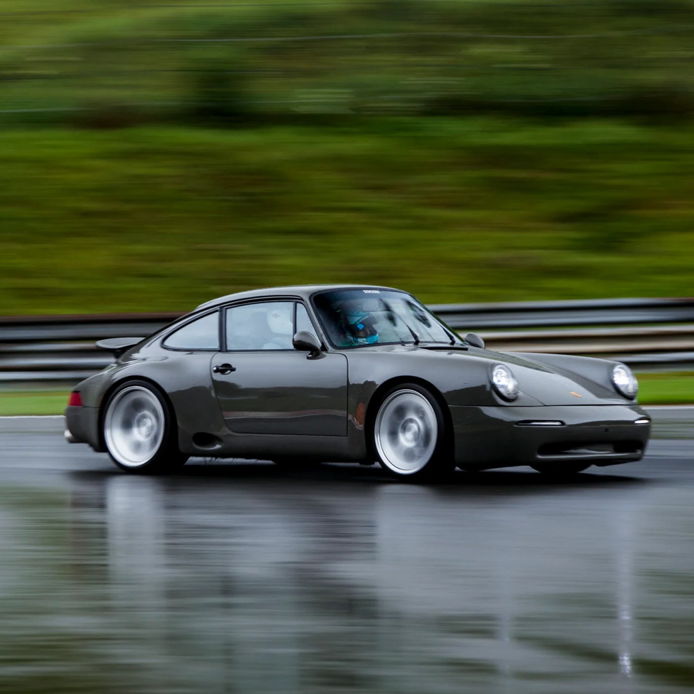 STROSEK MEGA30 driving on a wet track
