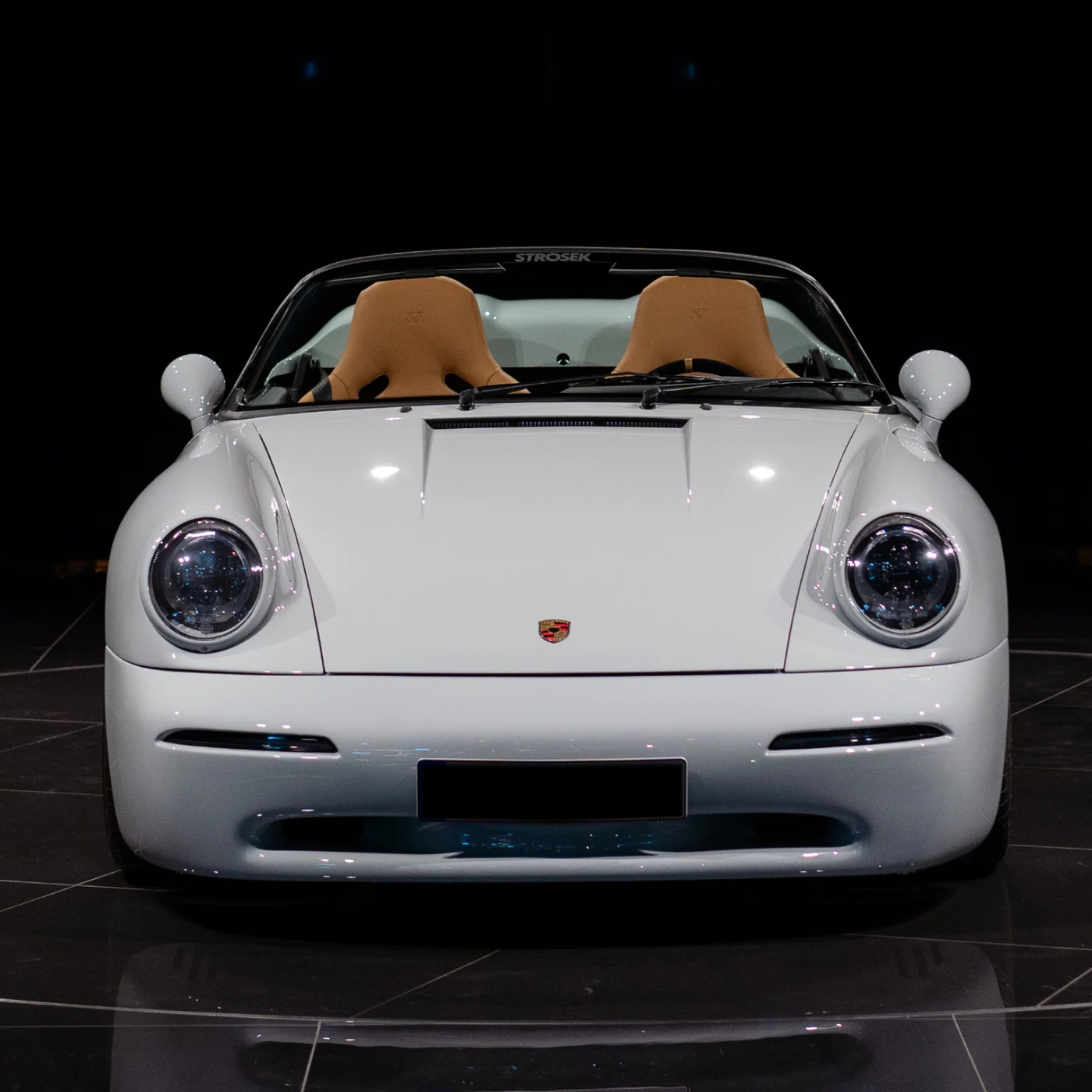STROSEK Speedster in white, seen from the front in a black studio